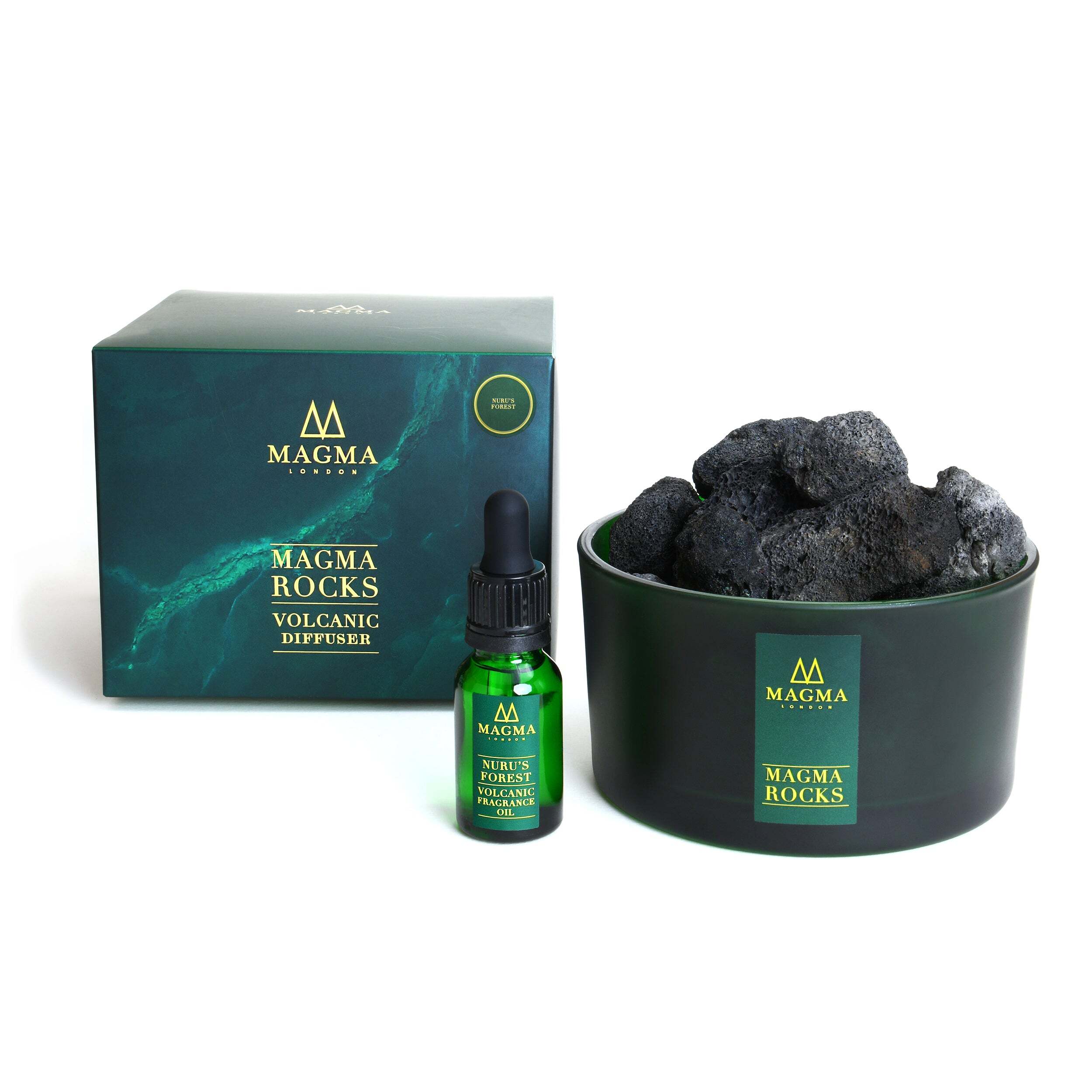 Magma Rocks volcanic diffuser set with rocks, bottle, and packaging on a white background