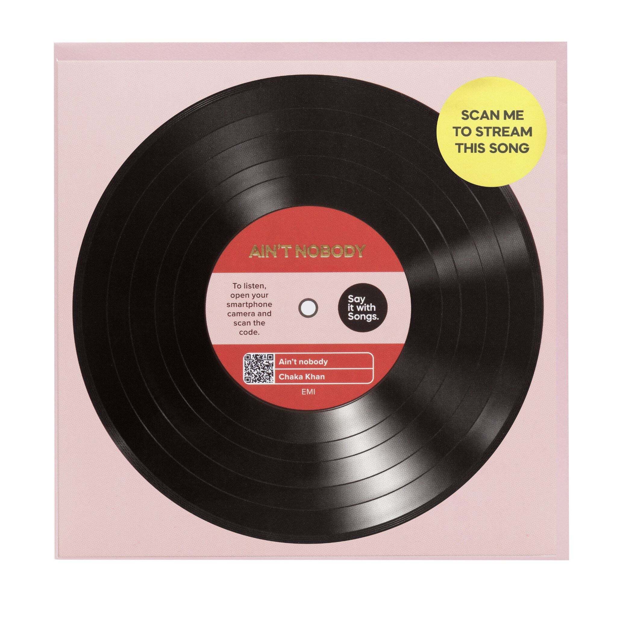 Vinyl record with a pink label and QR code on a purple background