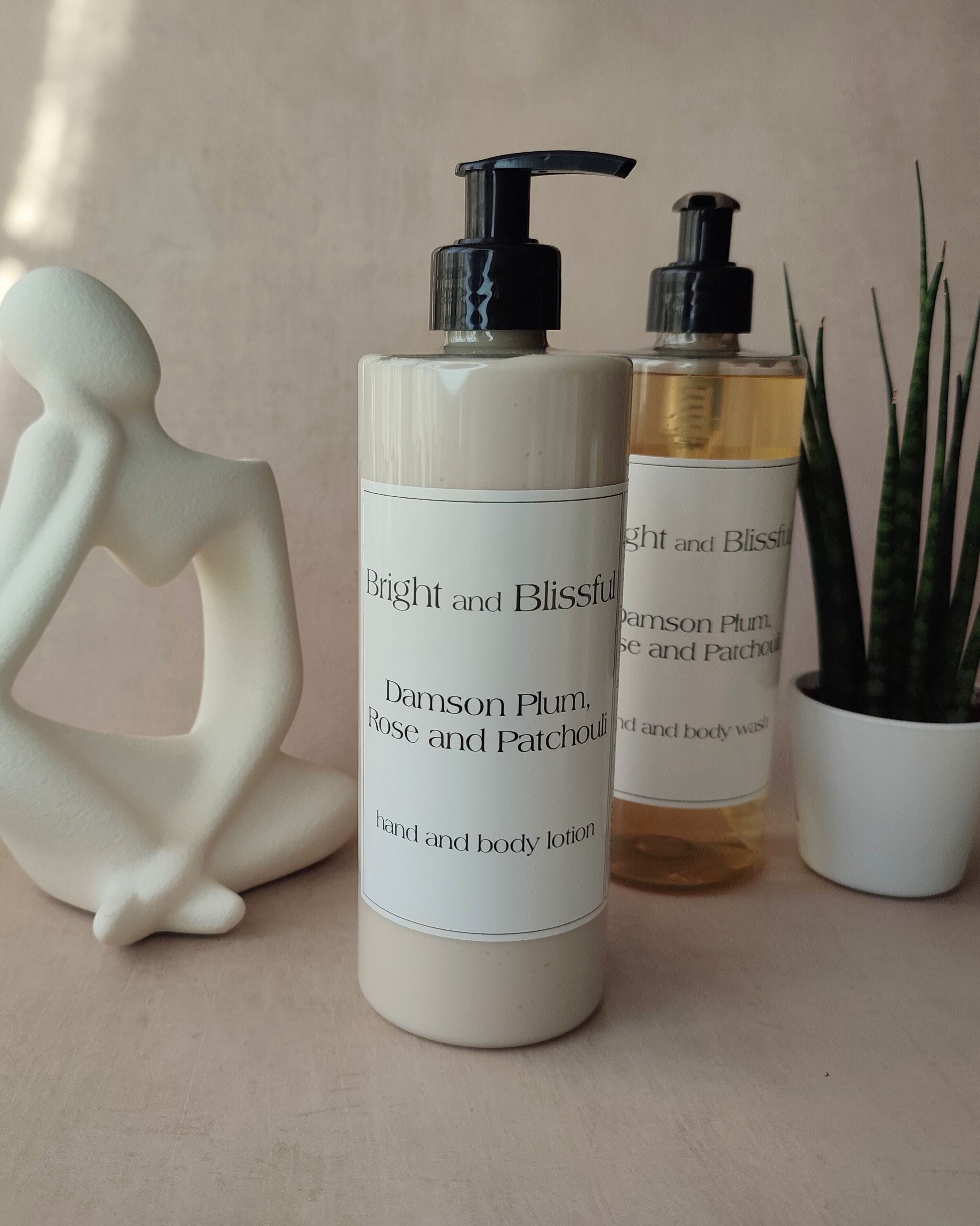 Two bottles of 'Bright and Blissful' skincare products on a neutral background with decorative elements.