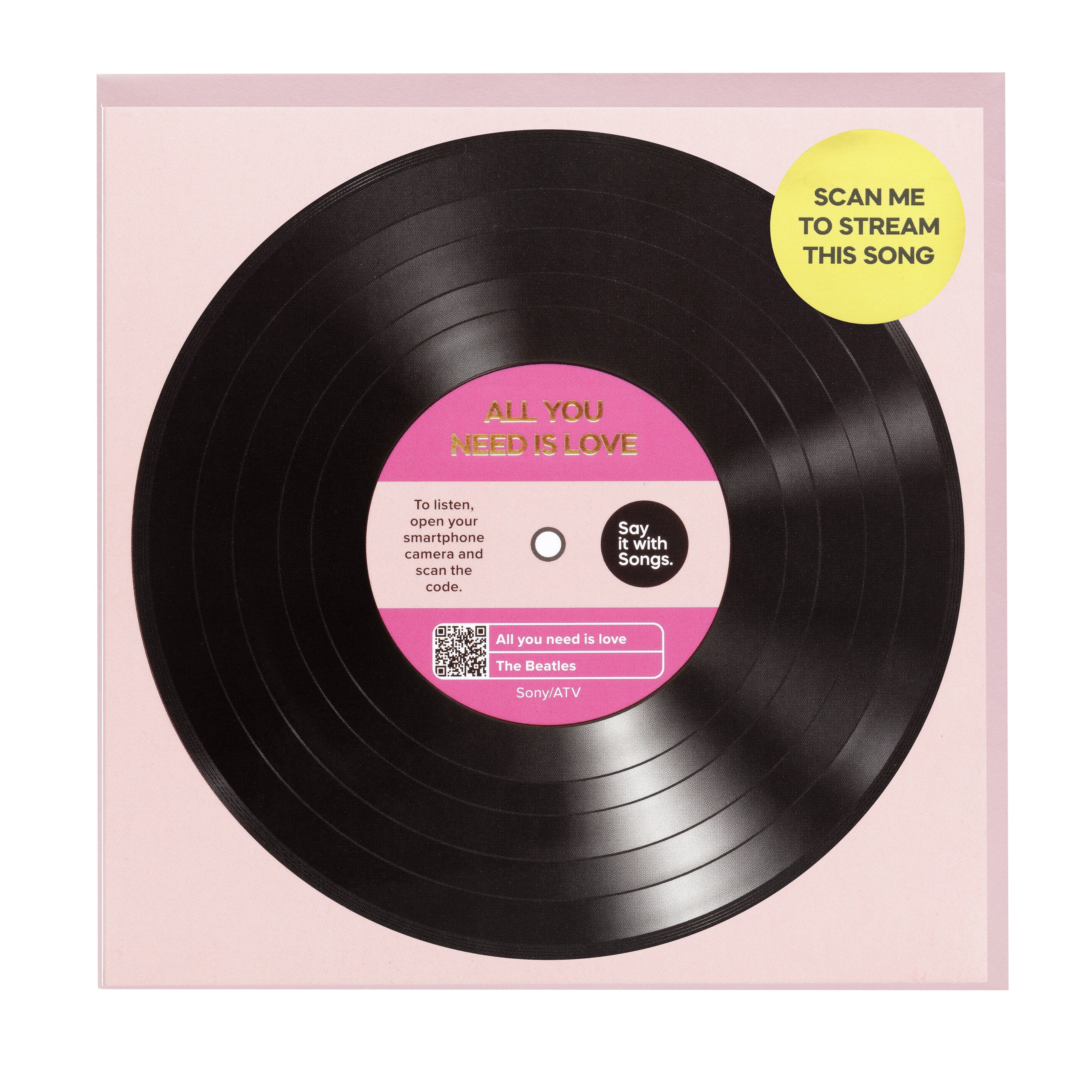 Vinyl record with a pink label and QR code on a light pink background