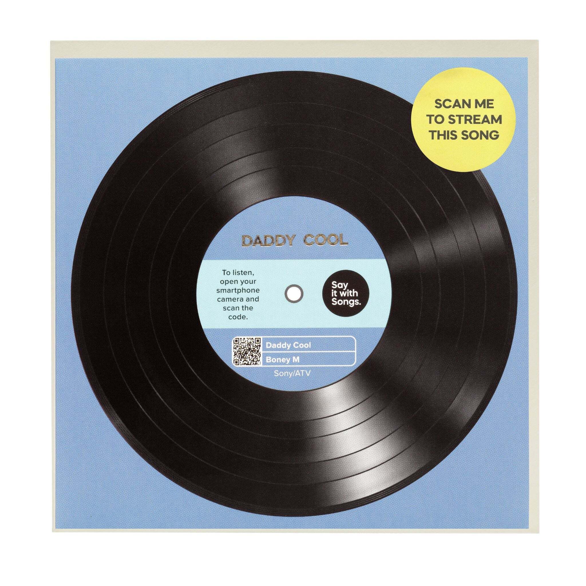 Vinyl record with a blue label and scan me to stream feature on a light blue background