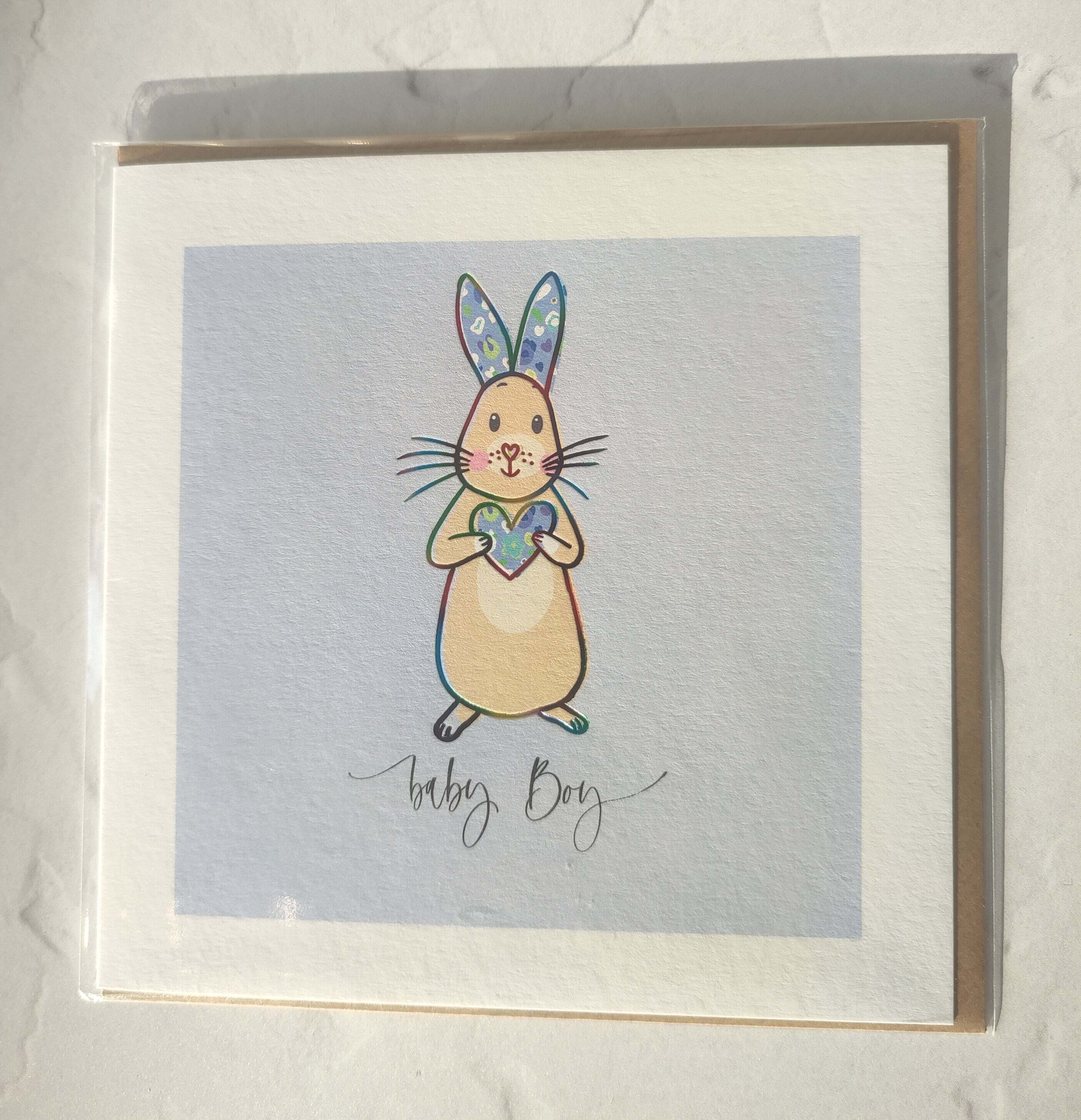 Card with a rabbit holding a heart and 'Baby Boy' text on a light blue background