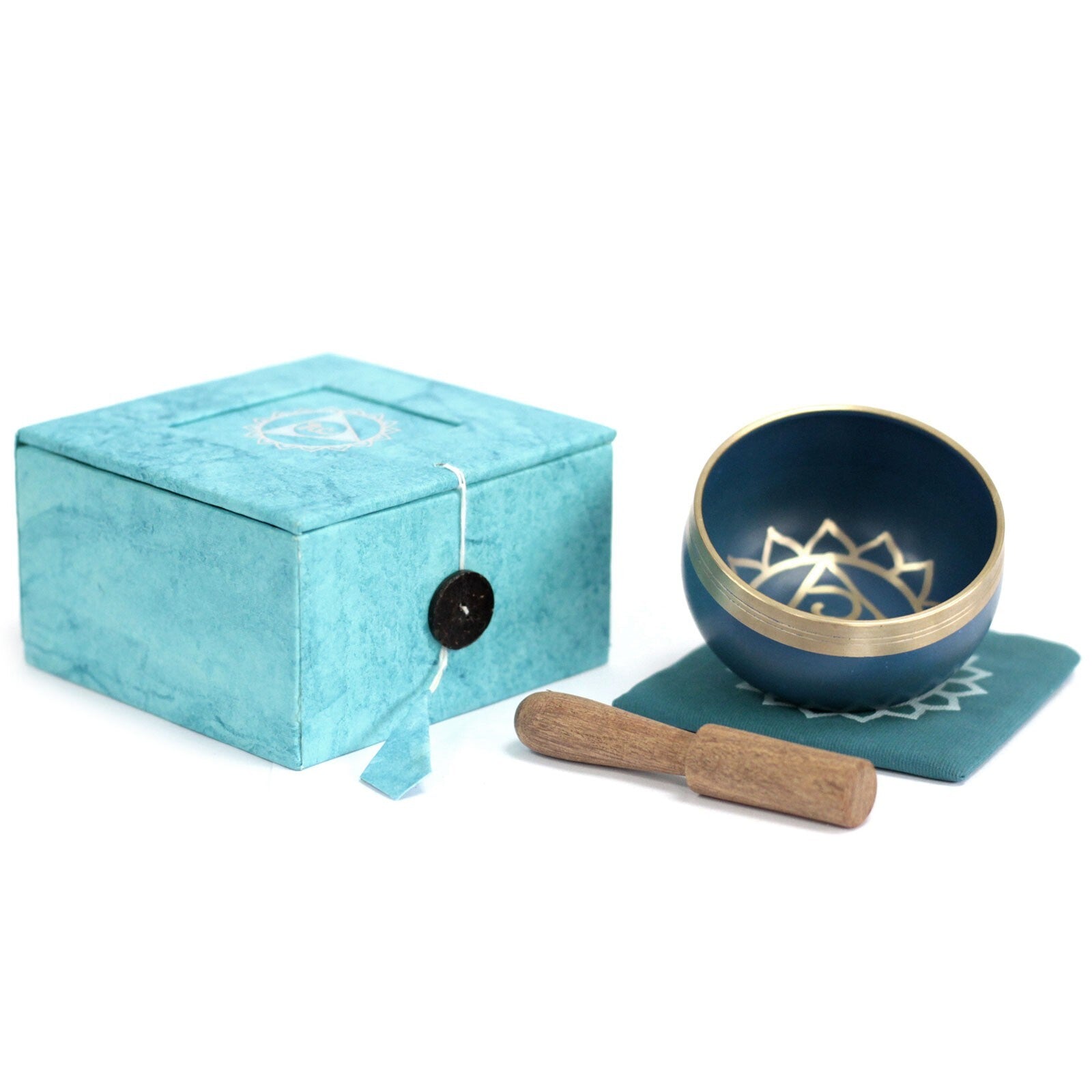 Light Blue singing bowl with gold interior, wooden stick, and turquoise box on a white background