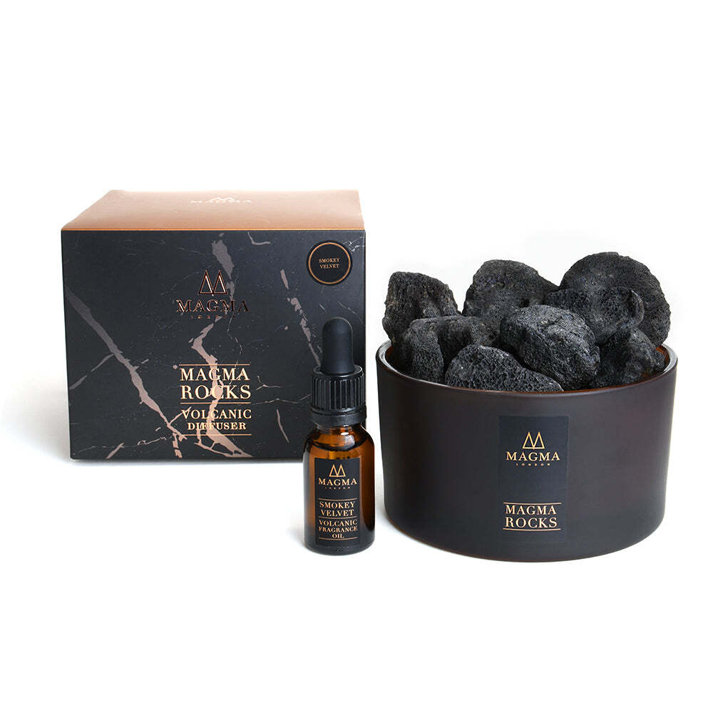 Magma Rocks volcanic diffuser set with bottle and rocks on a white background