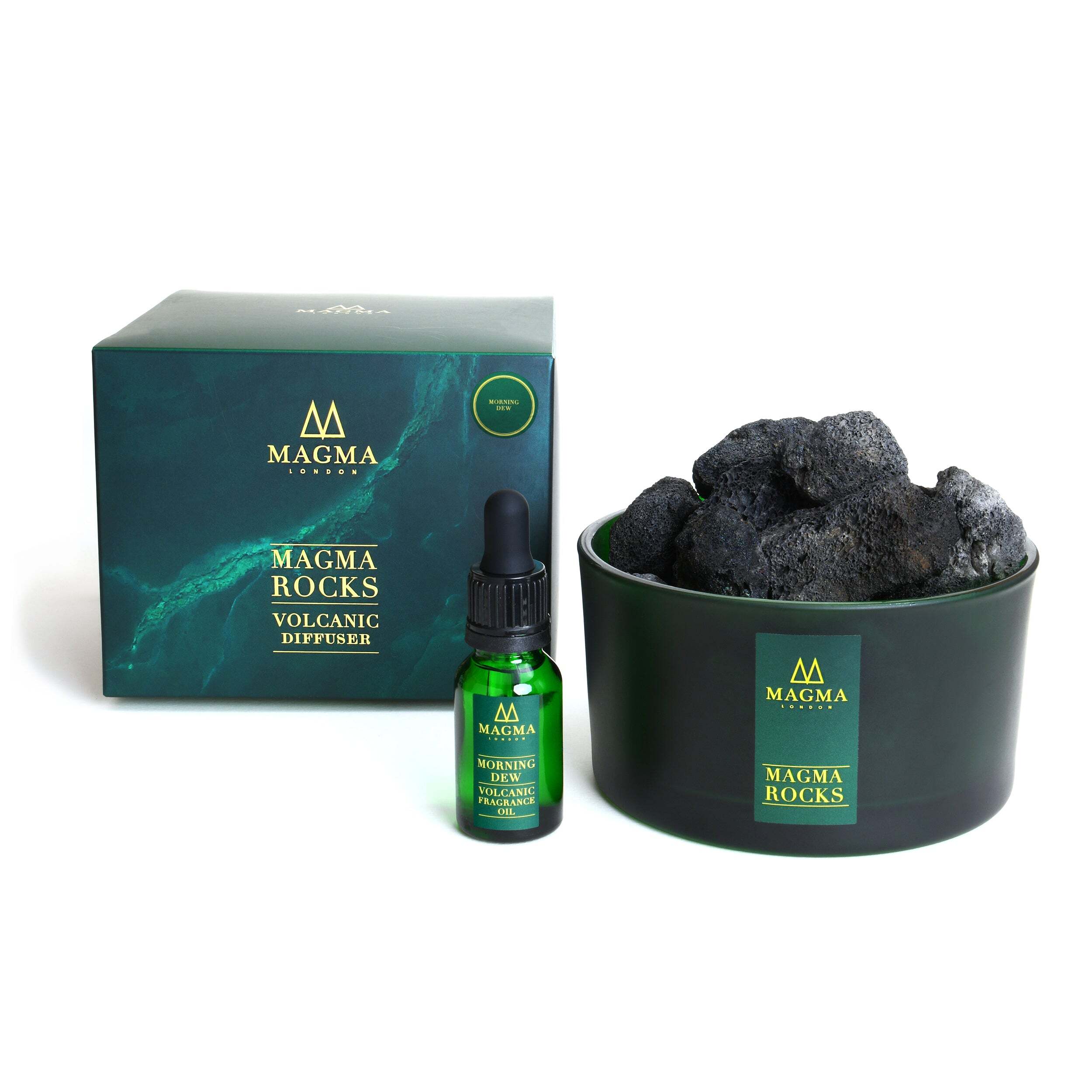 Magma Rocks volcanic diffuser set with box, bottle, and rocks on a white background