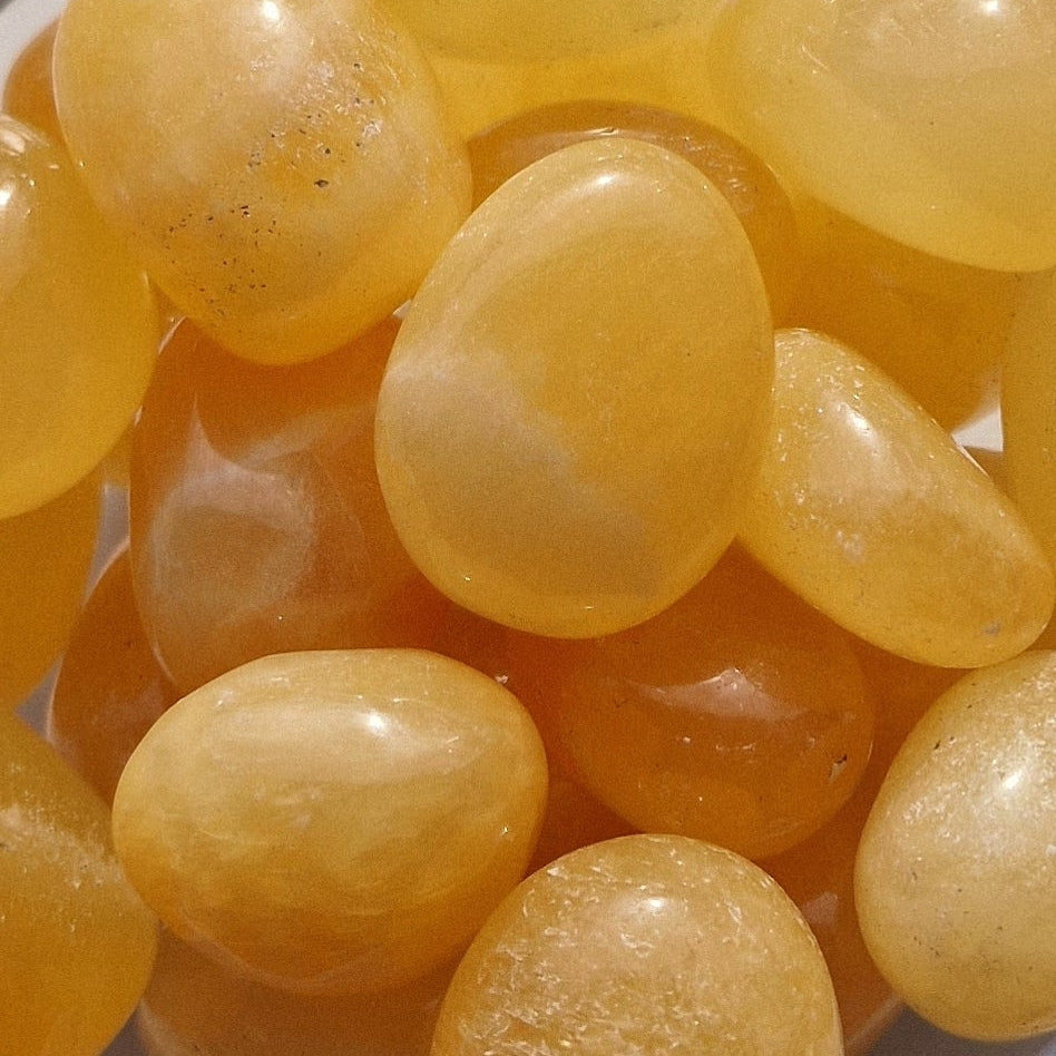 Orange calcilte tumblstones in a group
