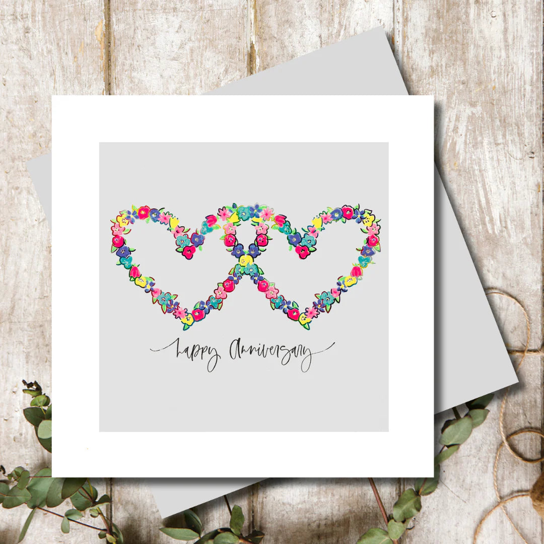 Greeting card with flowers and hearts