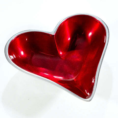 Red heart-shaped object on a white background