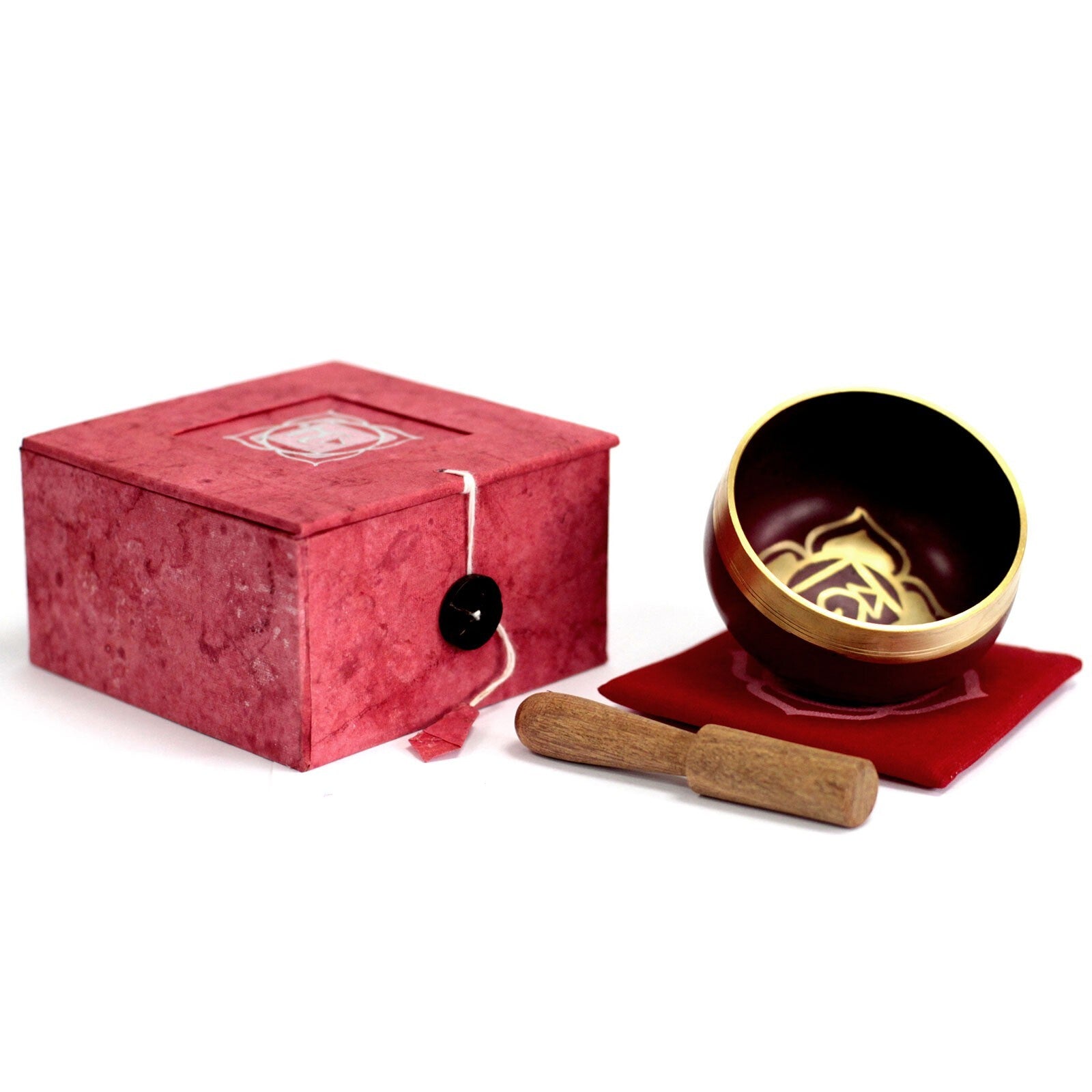 Red Singing bowl with wooden striker and red box on a white background
