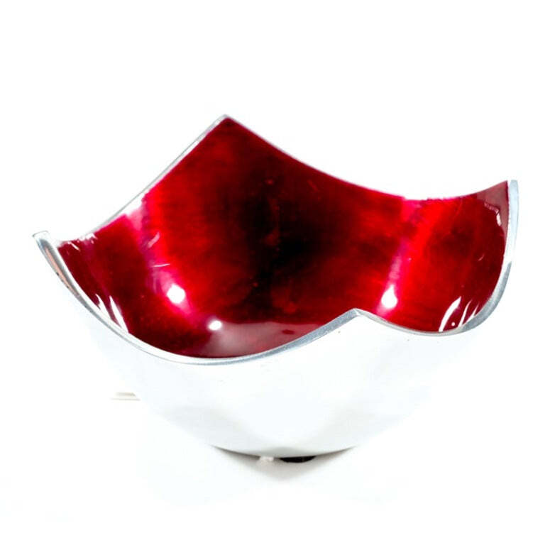 Decorative bowl with red insert on a white background