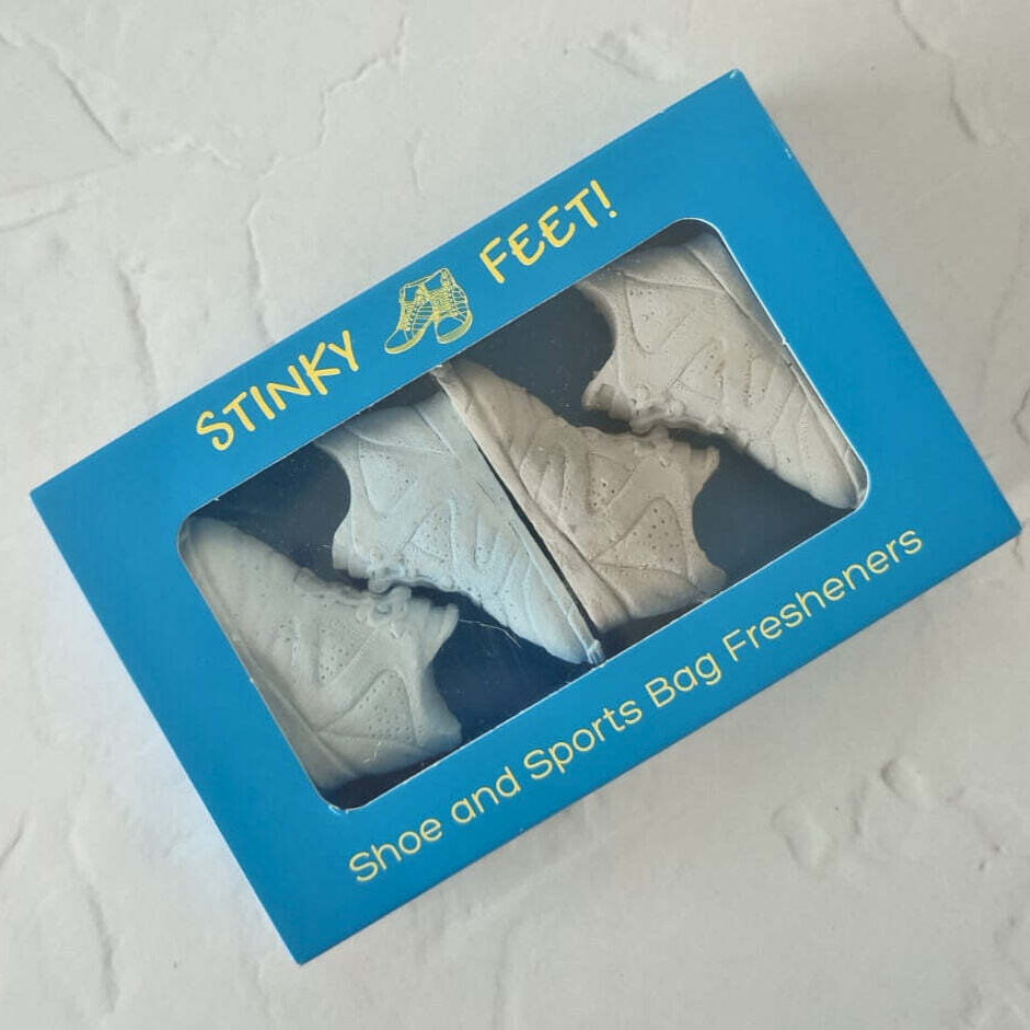 Stinky Feet! shoe and sports bag fresheners in a blue box on a textured white background
