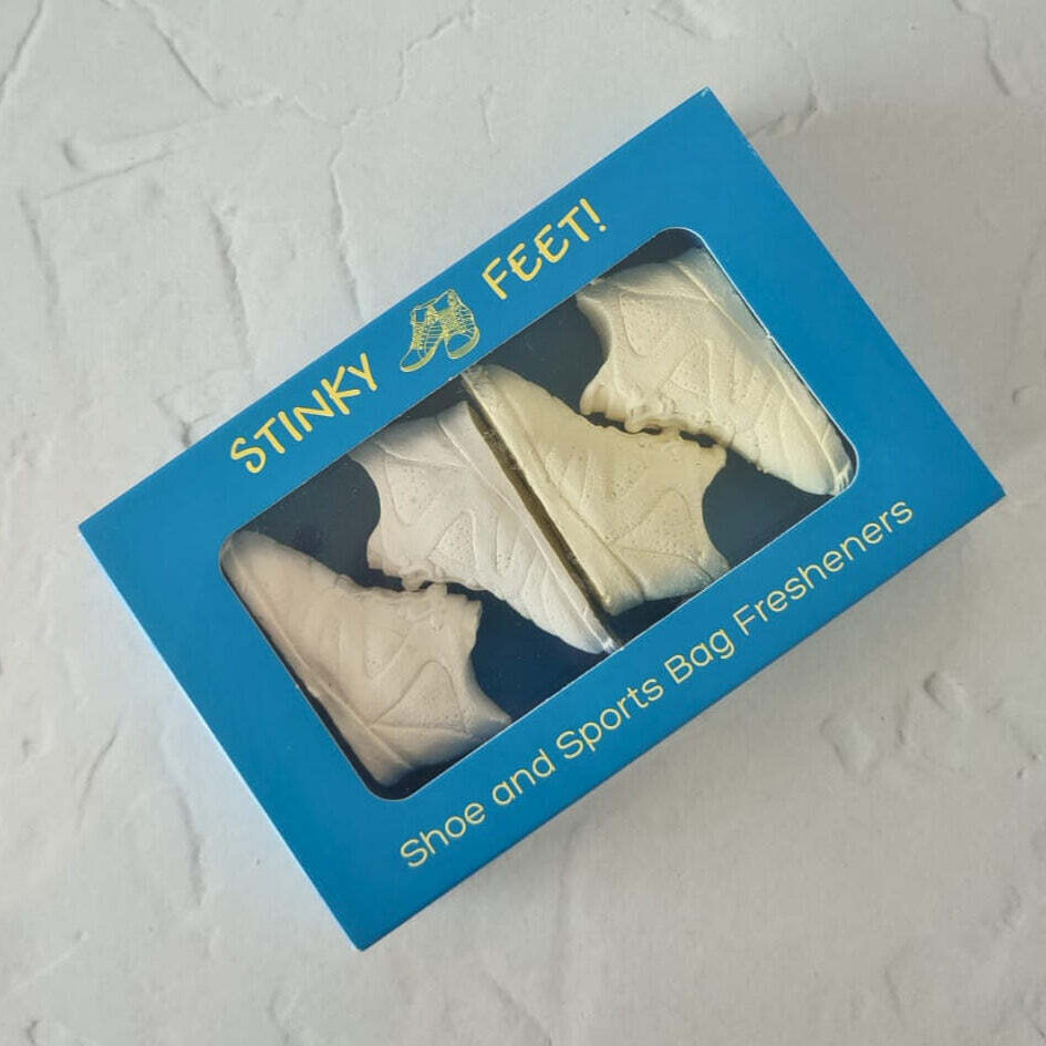 Stinky Feet shoe and sports bag fresheners in a blue box on a textured white background