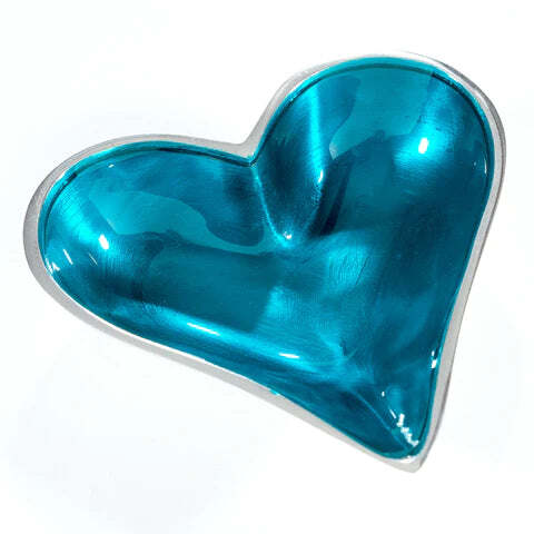 Turquoise heart-shaped bowl on a white background