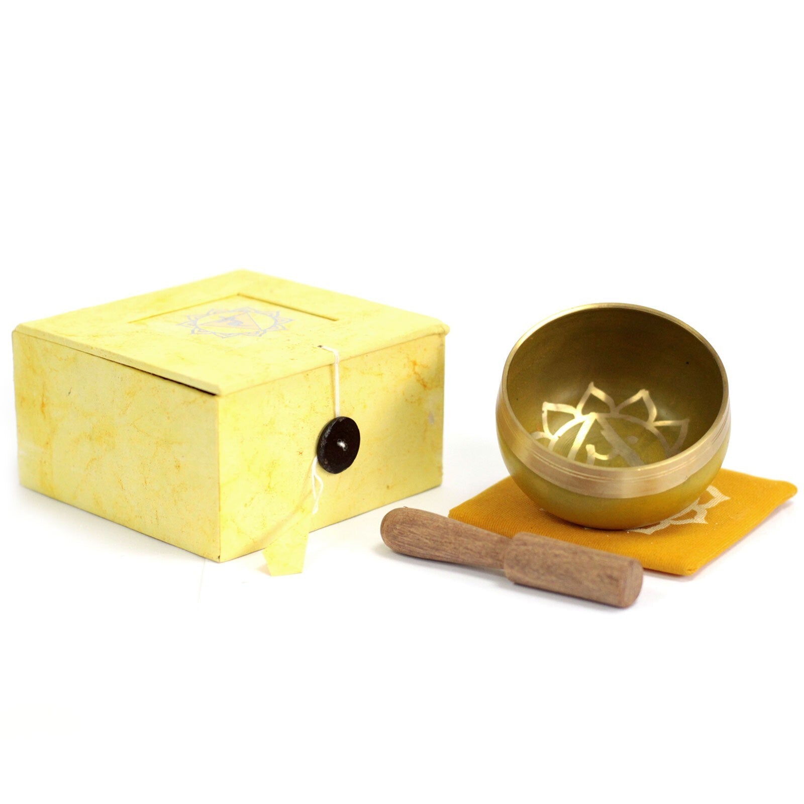 Yellow singing bowl with wooden striker and yellow box on a white background